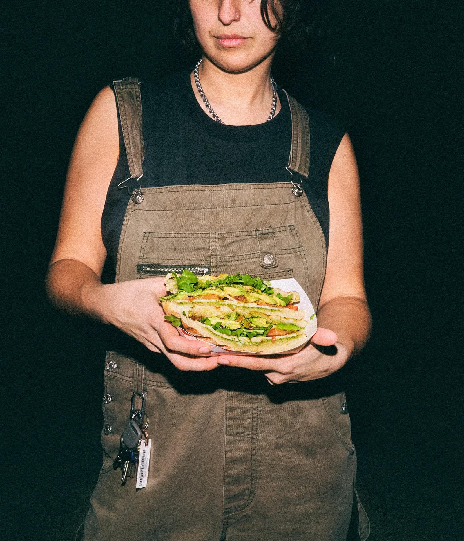 Person Holding Sandwich